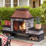 SUNJOY Outdoor Fireplace with Wood Storage and Chimney, Patio Wood Burning Fire Pit with Mesh Spark Screen Doors, Fire Poker, and Removable Grate, for Patio Garden Deck Backyard, Copper and Black