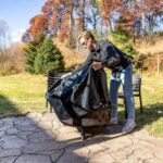 Sunnydaze Crossweave Outdoor Fire Pit - Wood-Burning Fire Pit for Outside with Spark Screen, Poker and Round Cover - 36-Inch - Bronze - Image 9